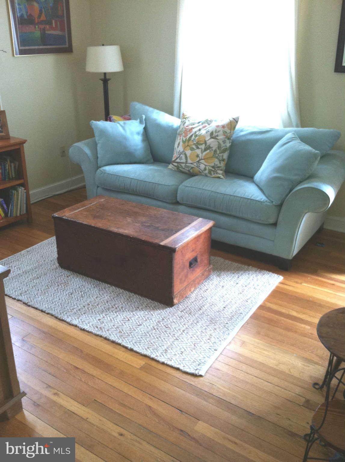 2508 Pinebrush Road Baltimore, MD 21209 - Photo 11 of 30 a living room with furniture and a couch