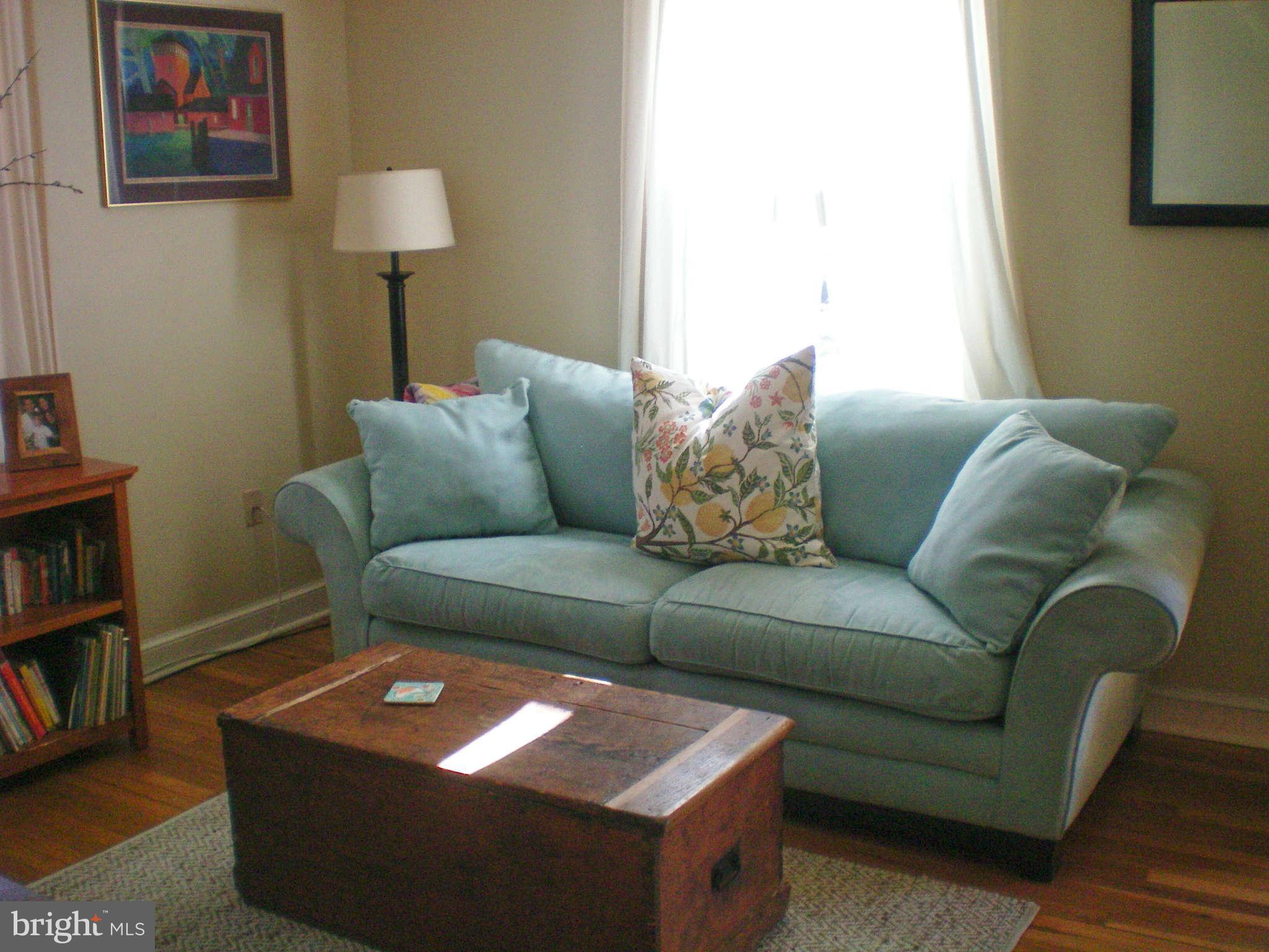 2508 Pinebrush Road Baltimore, MD 21209 - Photo 12 of 30 a living room with furniture and a couch