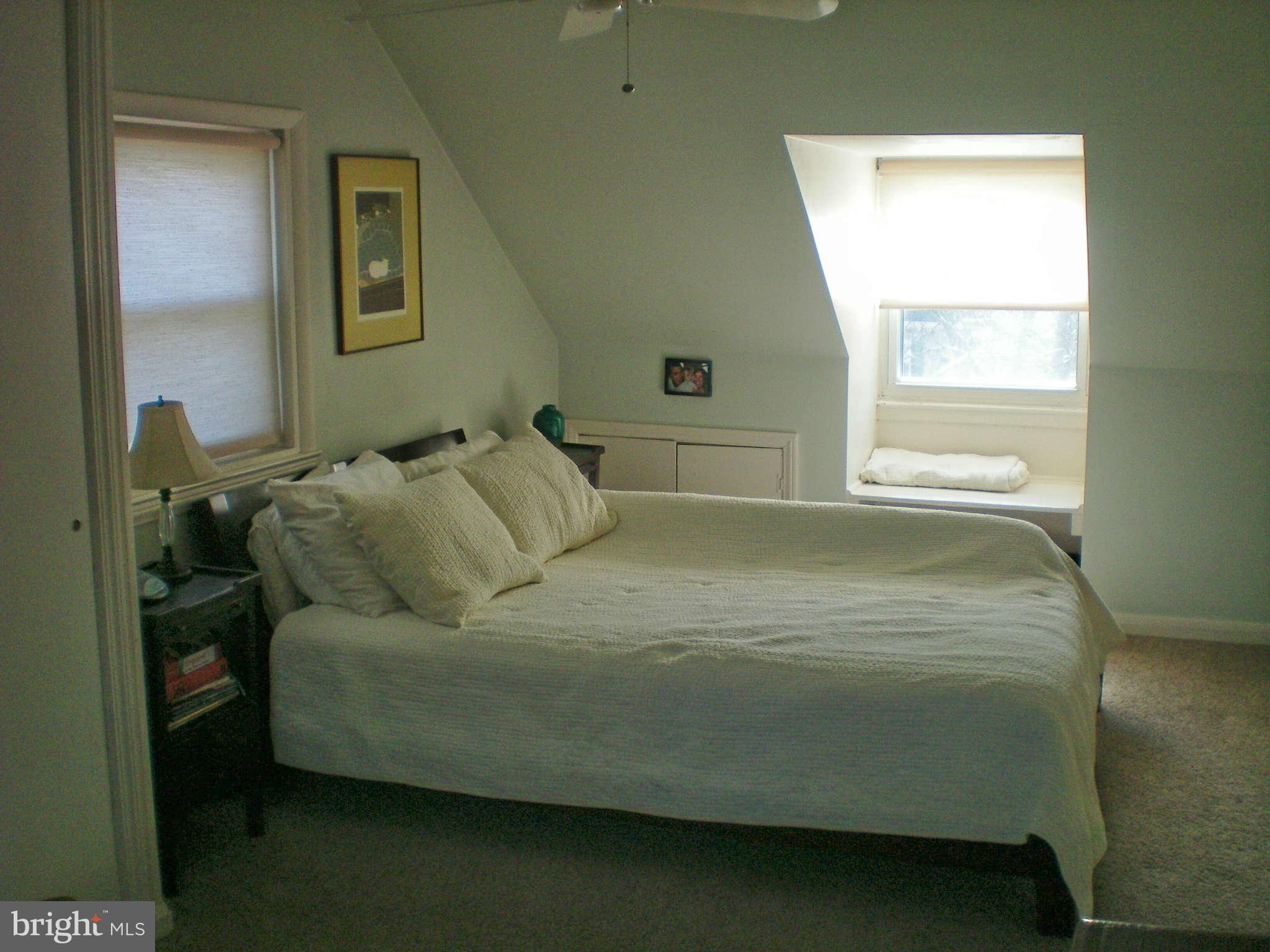 2508 Pinebrush Road Baltimore, MD 21209 - Photo 18 of 30 a bedroom with a bed and a window