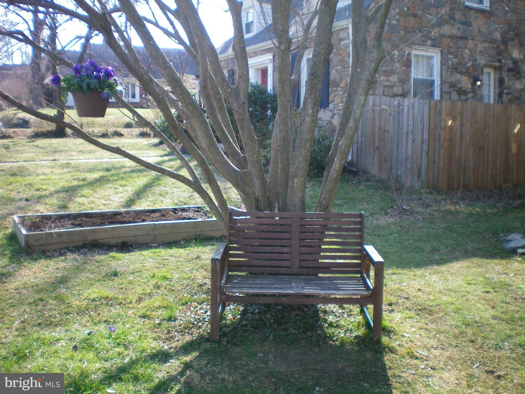 2508 Pinebrush Road Baltimore, MD 21209 - Photo 28 of 30 a view of a bench in a garden