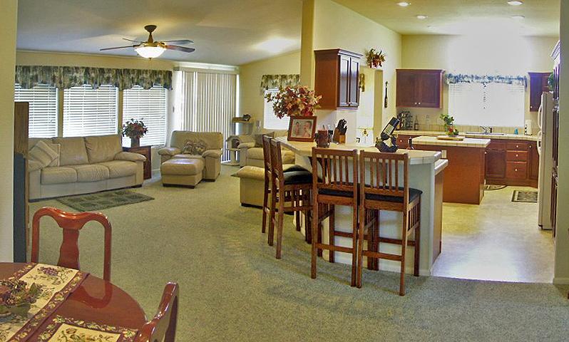 11938 Intermountain Road Redding, CA 96003 - Photo 14 of 14 a living room with furniture and a large window