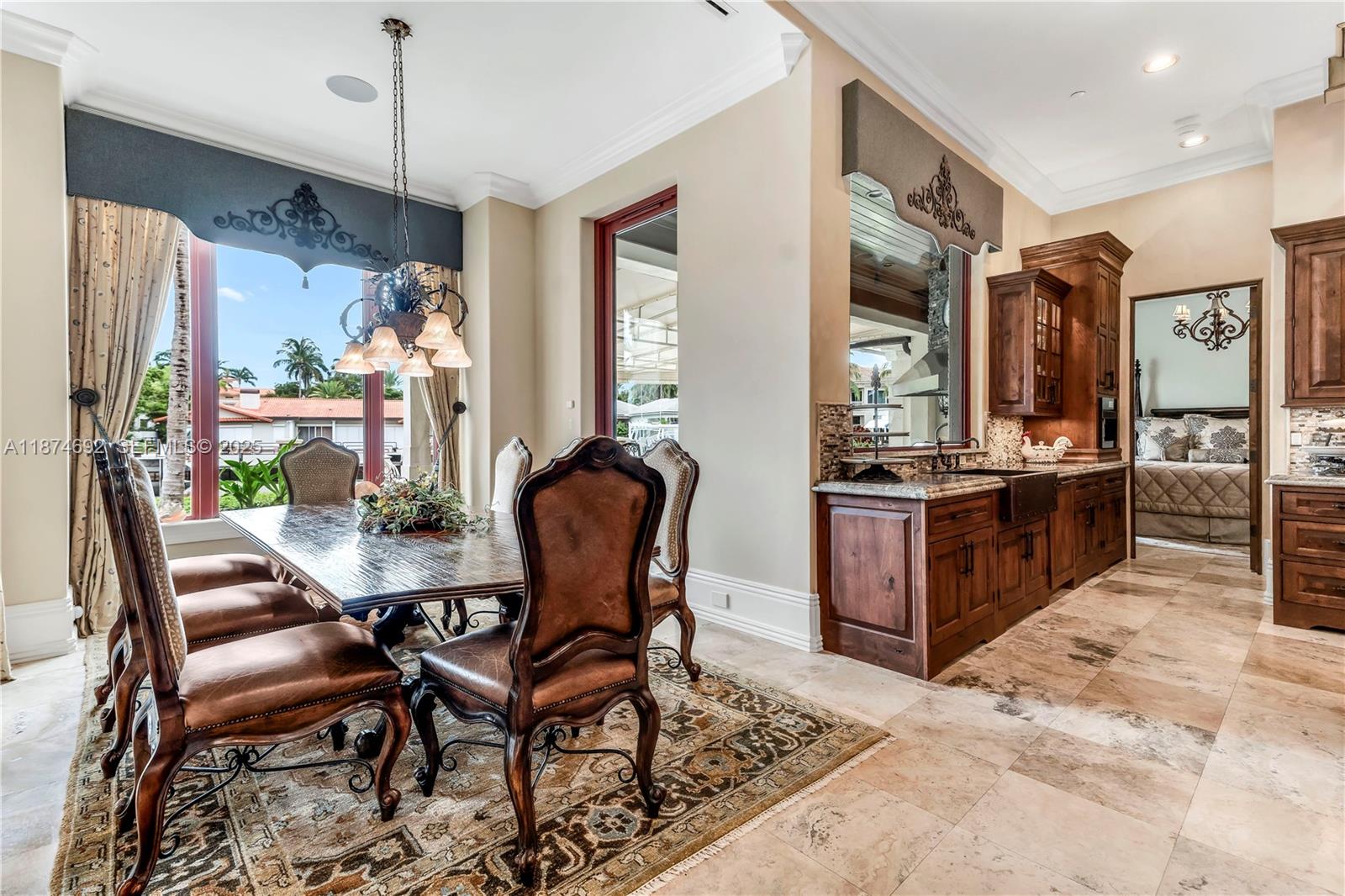 700 47th Street Boca Raton, FL 33431 - Photo 24 of 73 a view of a dining room with furniture window and wooden floor