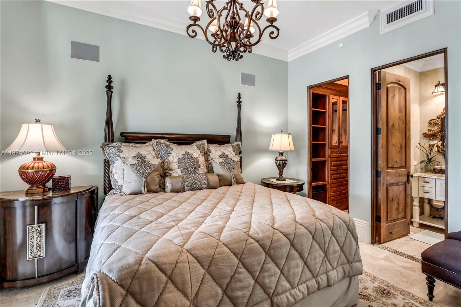 700 47th Street Boca Raton, FL 33431 - Photo 25 of 73 a bedroom with a bed and wooden floor