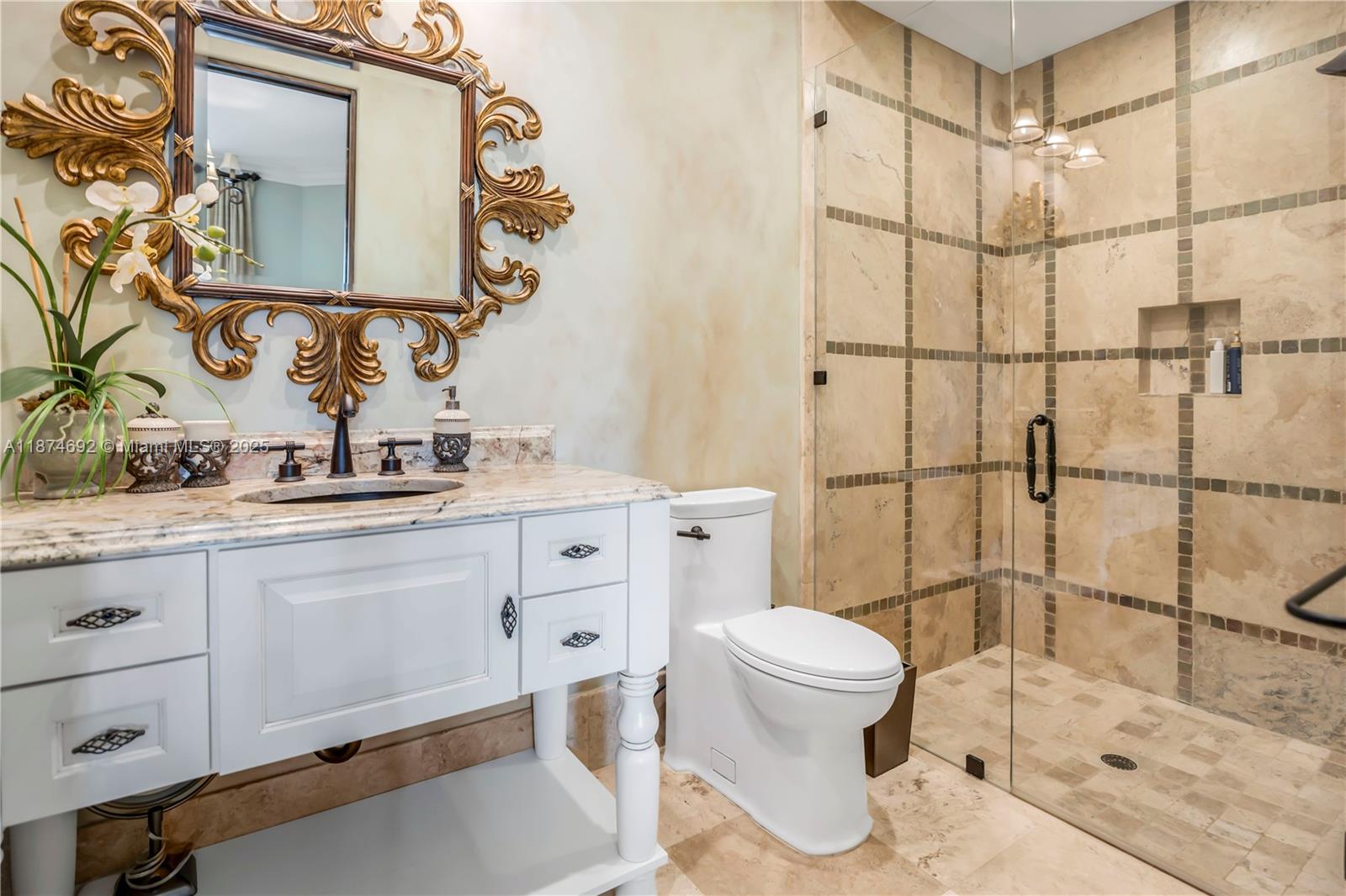 700 47th Street Boca Raton, FL 33431 - Photo 26 of 73 a bathroom with a sink toilet and shower
