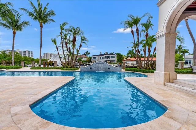 a kitchen with stainless steel appliances granite countertop a sink and stove top oven