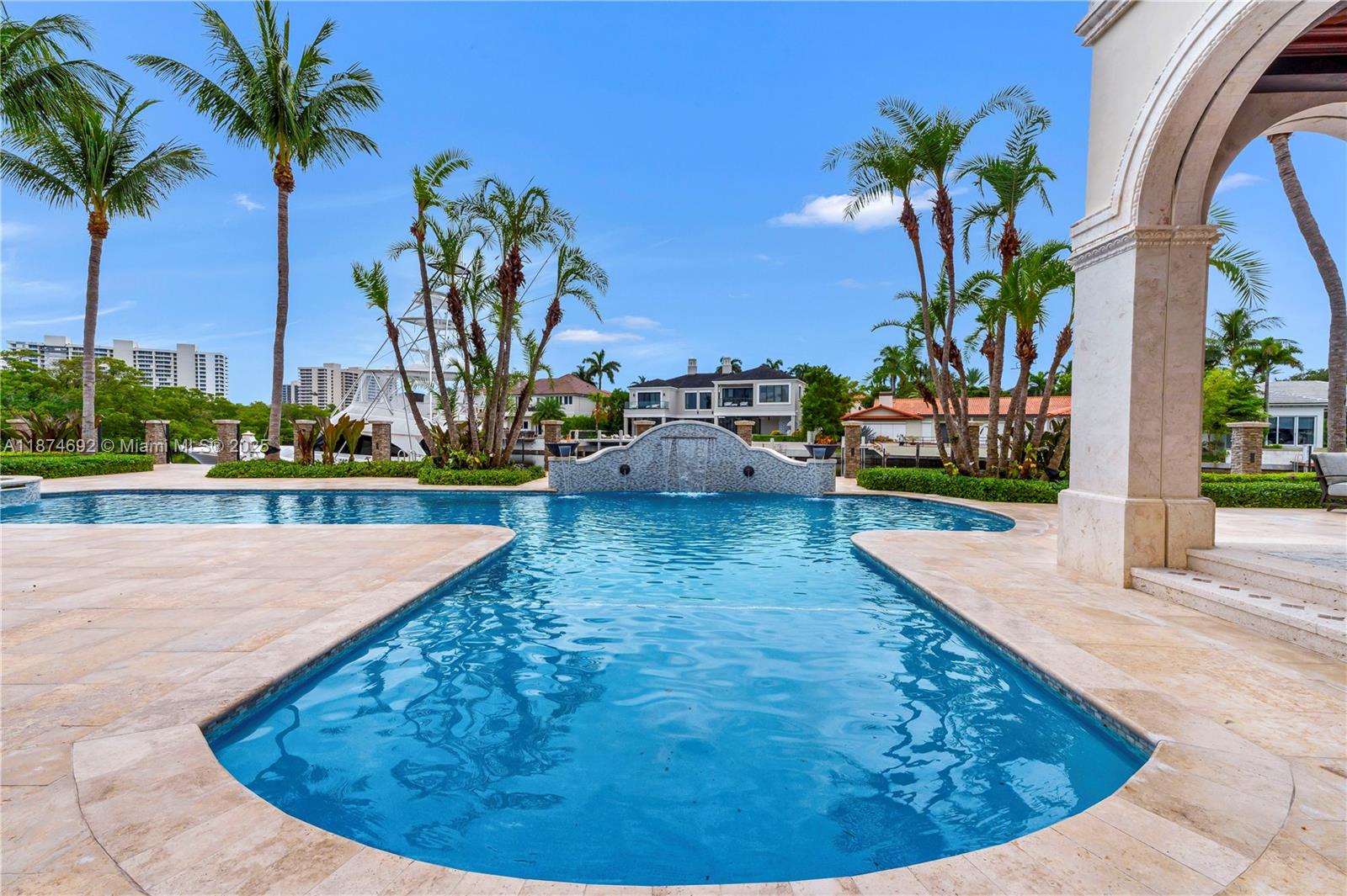 700 47th Street Boca Raton, FL 33431 - Photo 32 of 73 a view of a swimming pool with a chair