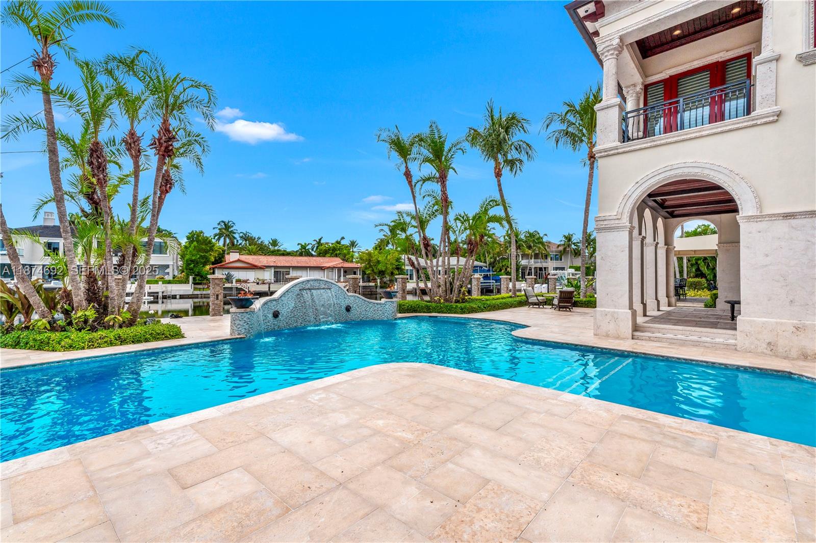 700 47th Street Boca Raton, FL 33431 - Photo 34 of 73 a view of swimming pool with lawn chairs and plants