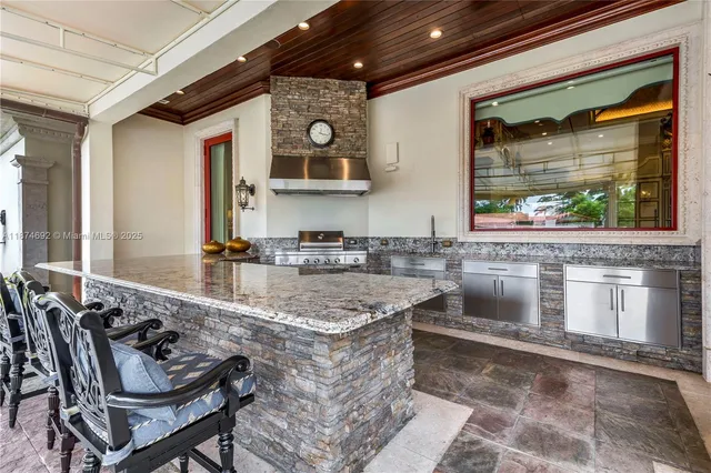 a bathroom with a bathtub and a sink