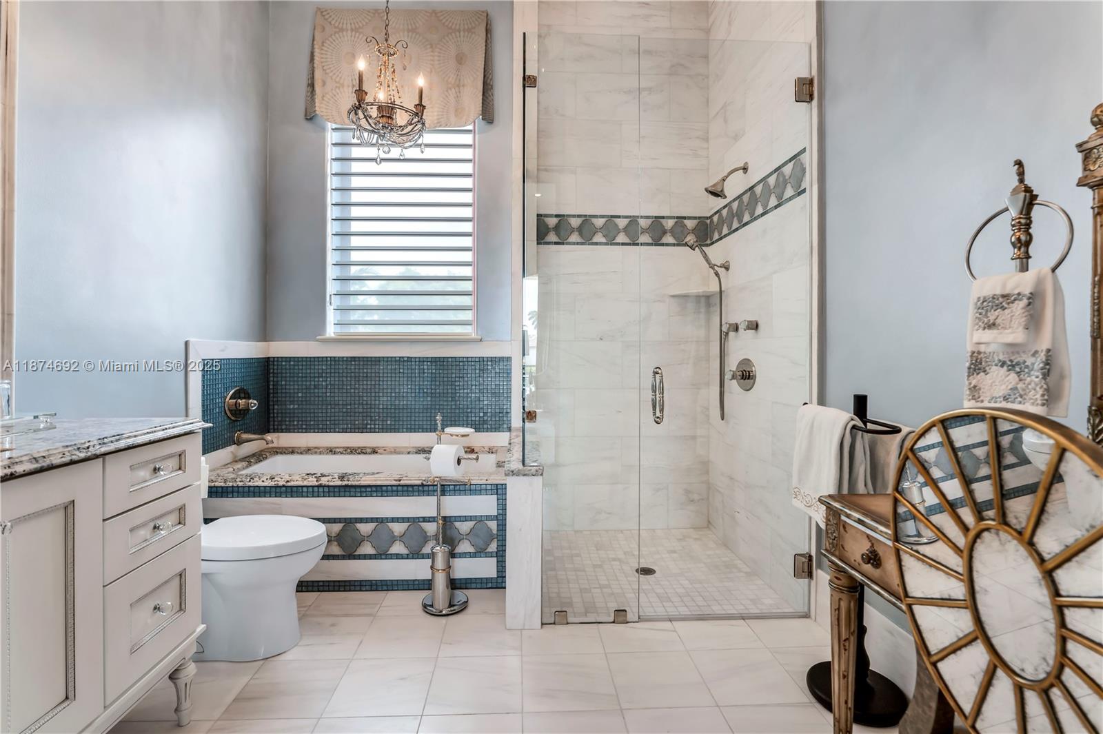 700 47th Street Boca Raton, FL 33431 - Photo 49 of 73 a bathroom with a bathtub and a sink