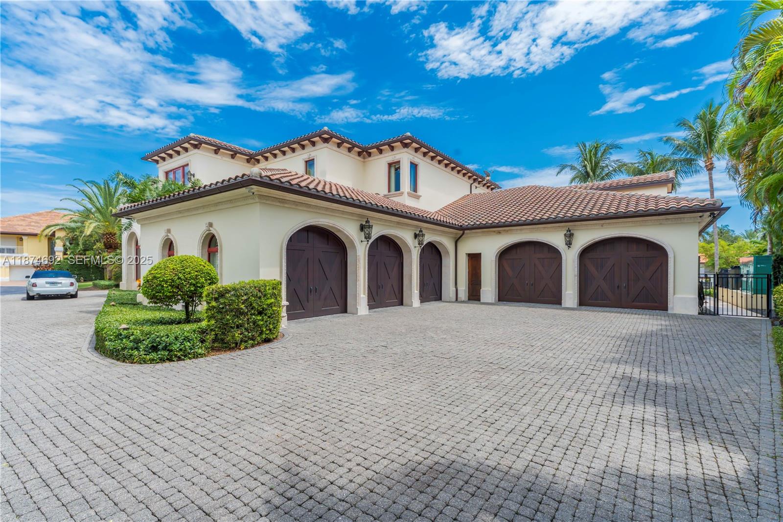 700 47th Street Boca Raton, FL 33431 - Photo 68 of 73 a view of a house with a yard and potted plants