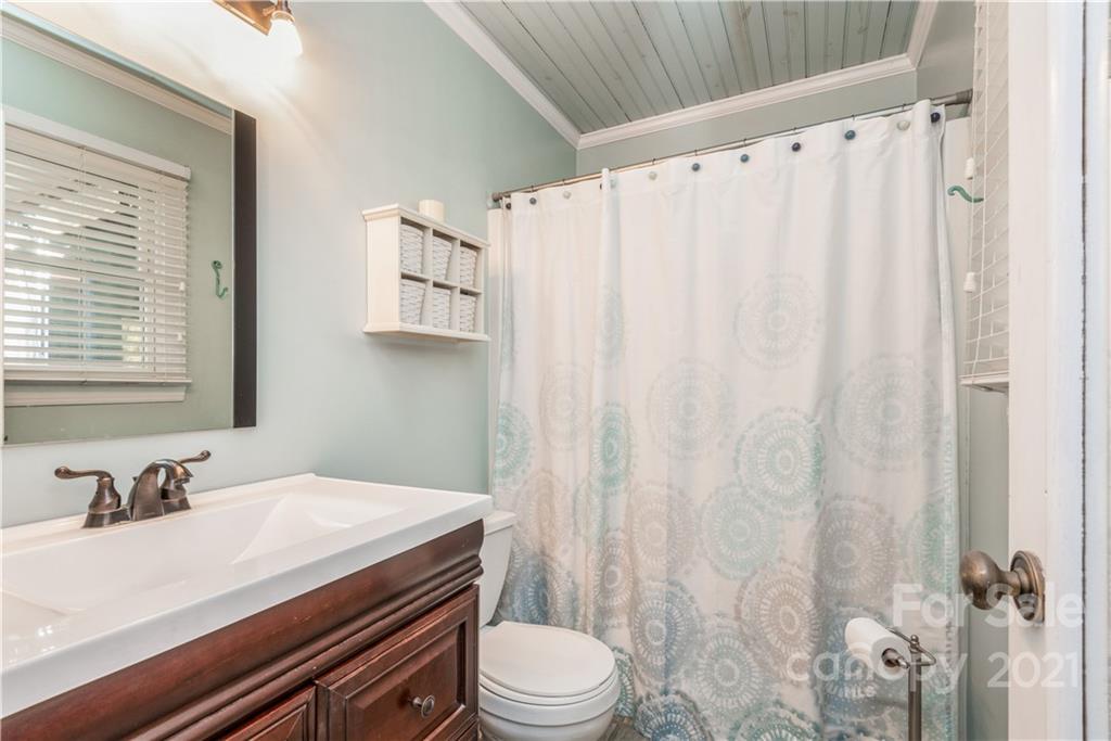 8619 Unity Church Road Denver, NC 28037 - Photo 17 of 24 a bathroom with a sink toilet and shower