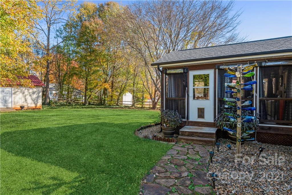 8619 Unity Church Road Denver, NC 28037 - Photo 22 of 24 a view of a house with backyard
