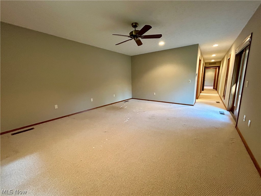 8763 Timber Edge Drive North Ridgeville, OH 44039 - Photo 17 of 40 Carpeted spare room with ceiling fan