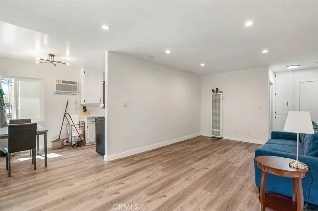 a kitchen with stainless steel appliances a sink stove and refrigerator