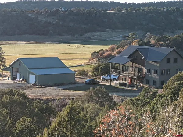 a view of a house with a street