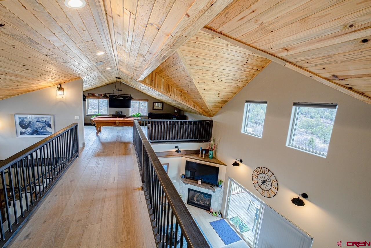 492 Fox Fire Ridge Road Bayfield, CO 81122 - Photo 25 of 44 a view of a kitchen with wooden floor