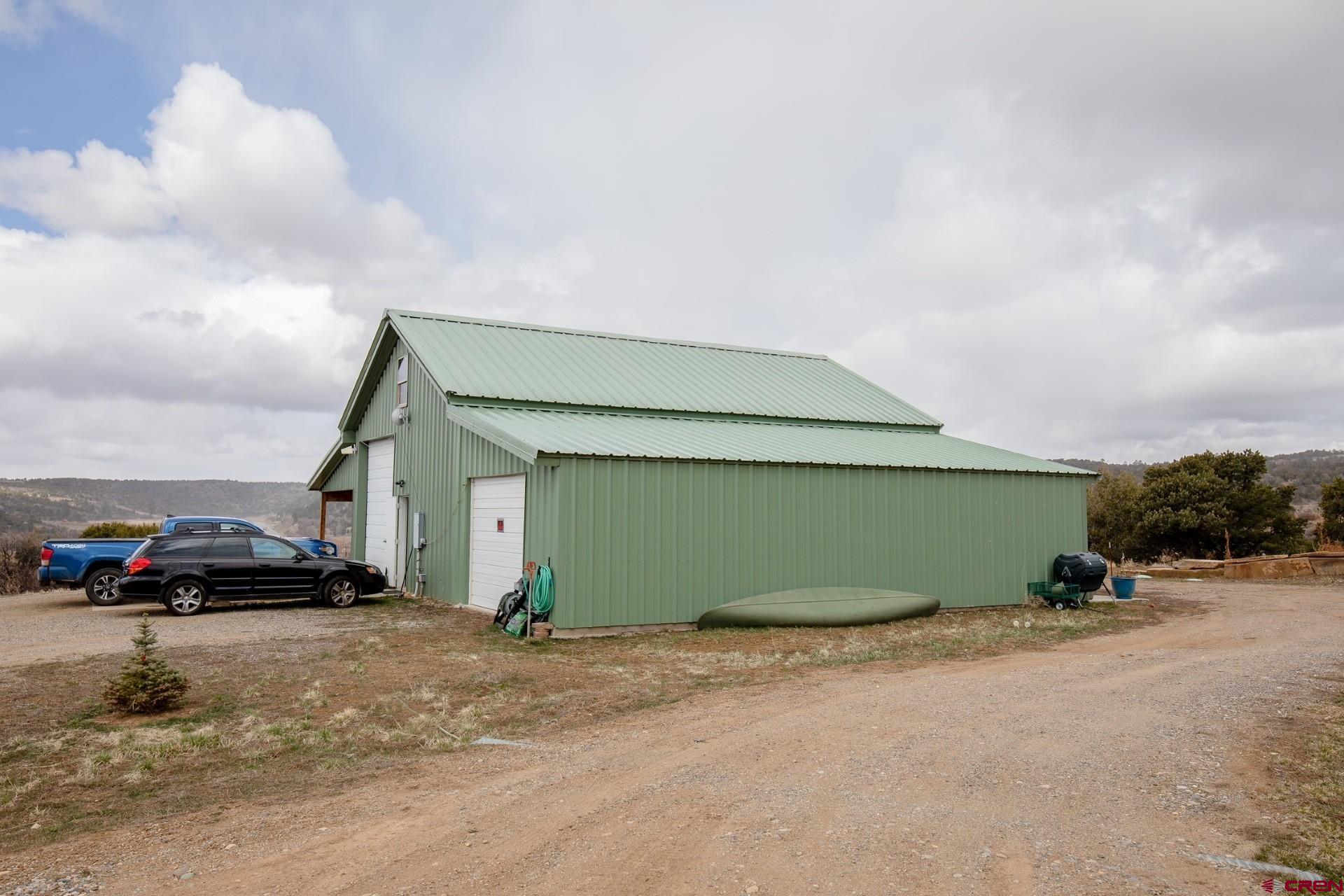 492 Fox Fire Ridge Road Bayfield, CO 81122 - Photo 37 of 44 a view of parking space and car parked
