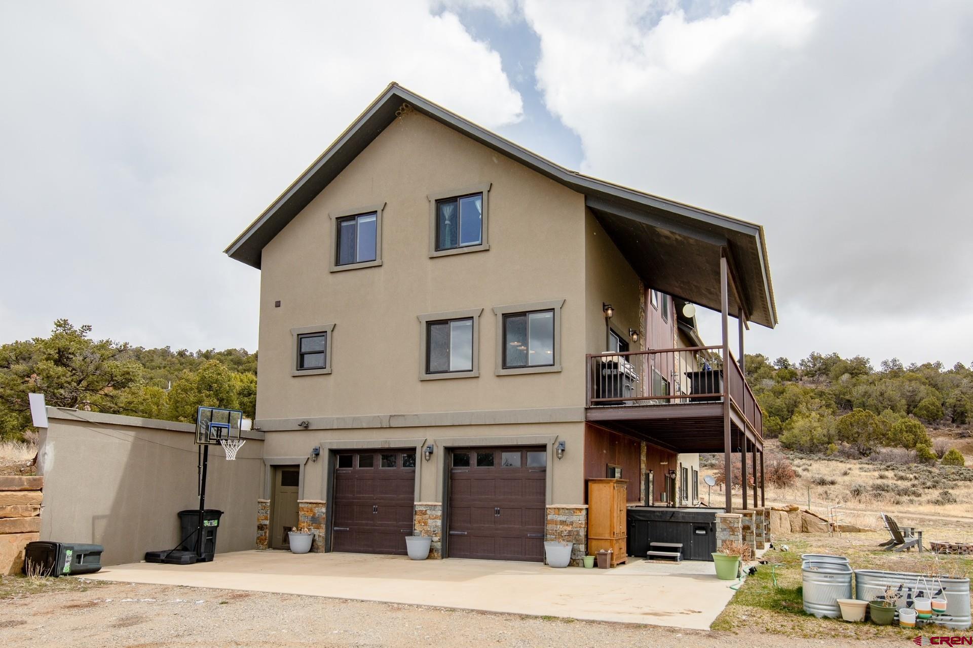 492 Fox Fire Ridge Road Bayfield, CO 81122 - Photo 4 of 44 a view of a house with a street