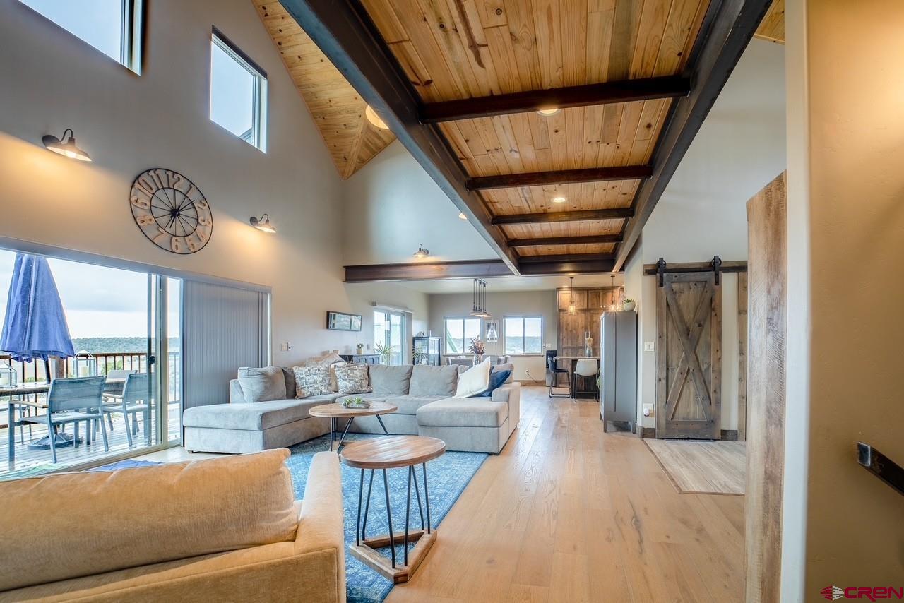 492 Fox Fire Ridge Road Bayfield, CO 81122 - Photo 7 of 44 a living room with furniture and a large window