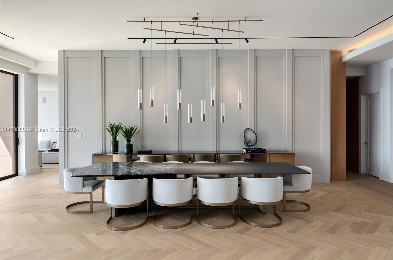 5310 North Bay Road Miami Beach, FL 33140 - Photo 12 of 35 a dining room with furniture