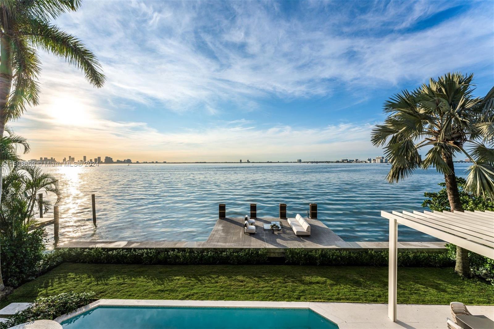 5310 North Bay Road Miami Beach, FL 33140 - Photo 29 of 35 a view of a lake with a terrace