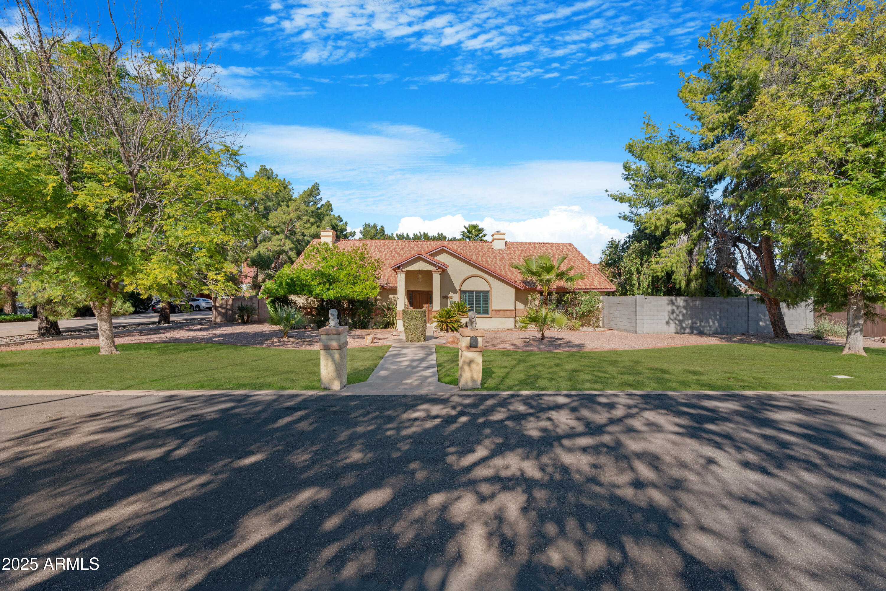 3152 East Irwin Avenue Mesa, AZ 85204 - Photo 1 of 39 a view of street with houses