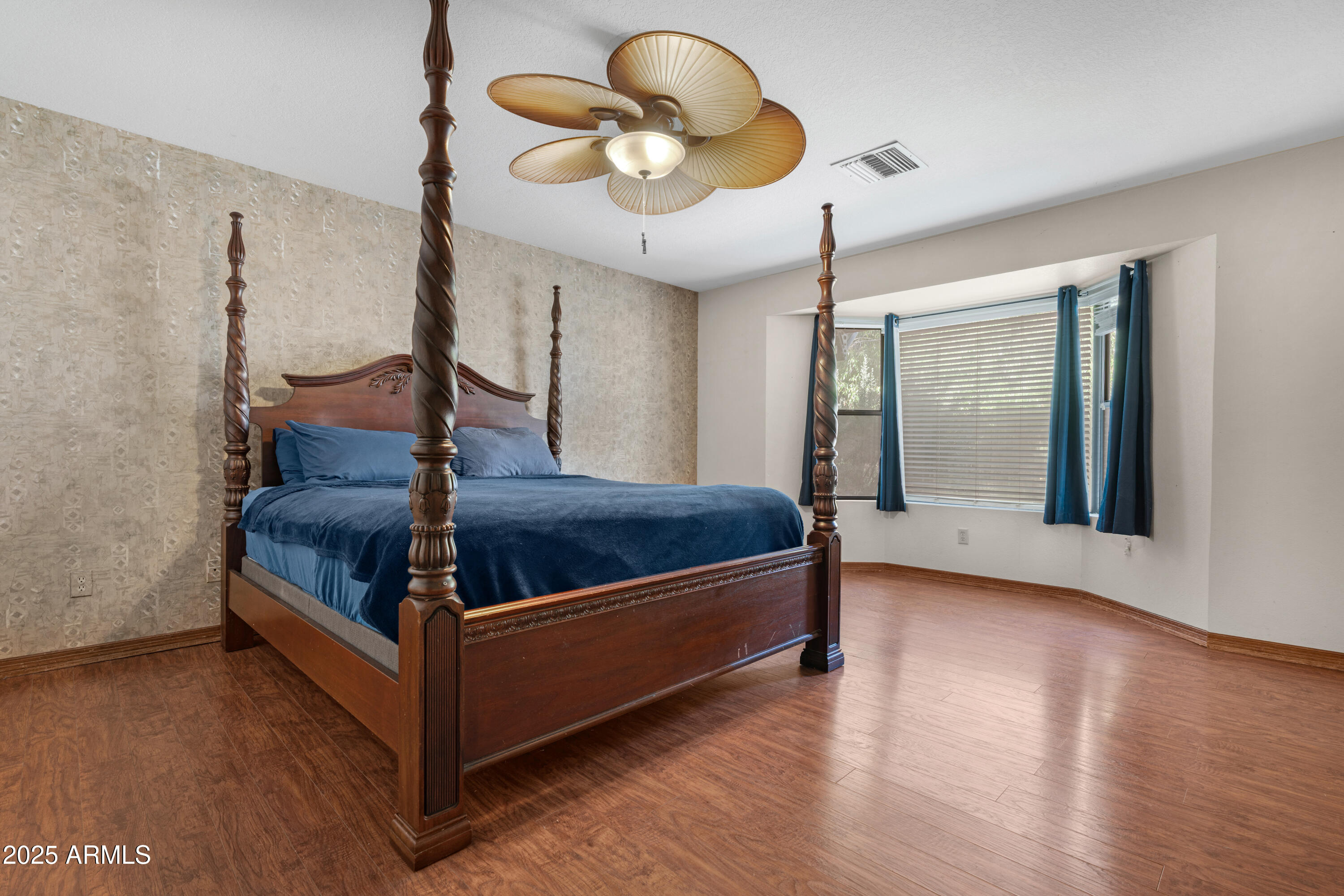 3152 East Irwin Avenue Mesa, AZ 85204 - Photo 12 of 39 a view of a livingroom with furniture and wooden floor