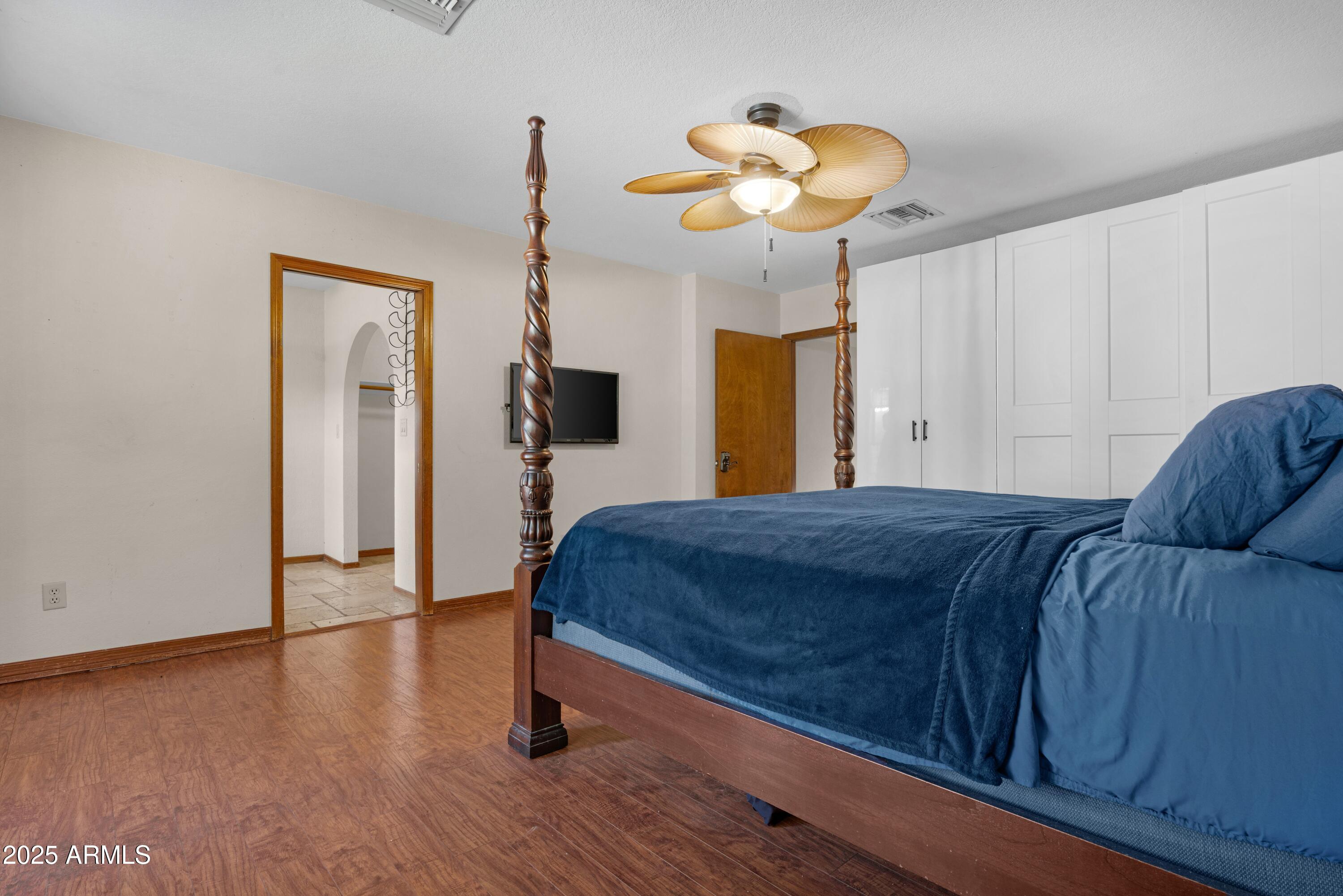 3152 East Irwin Avenue Mesa, AZ 85204 - Photo 25 of 39 a bed room with a bed