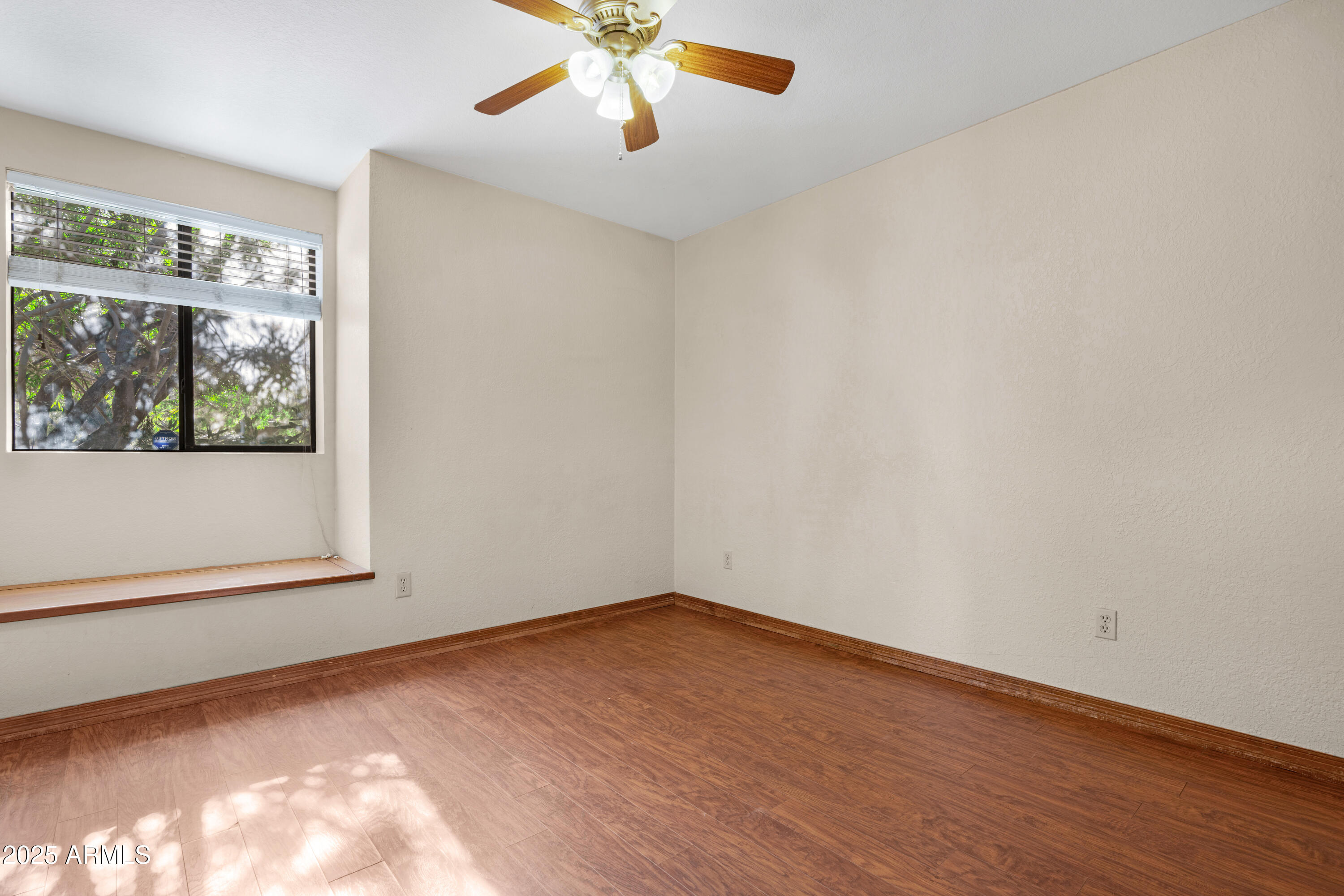 3152 East Irwin Avenue Mesa, AZ 85204 - Photo 28 of 39 an empty room with a window