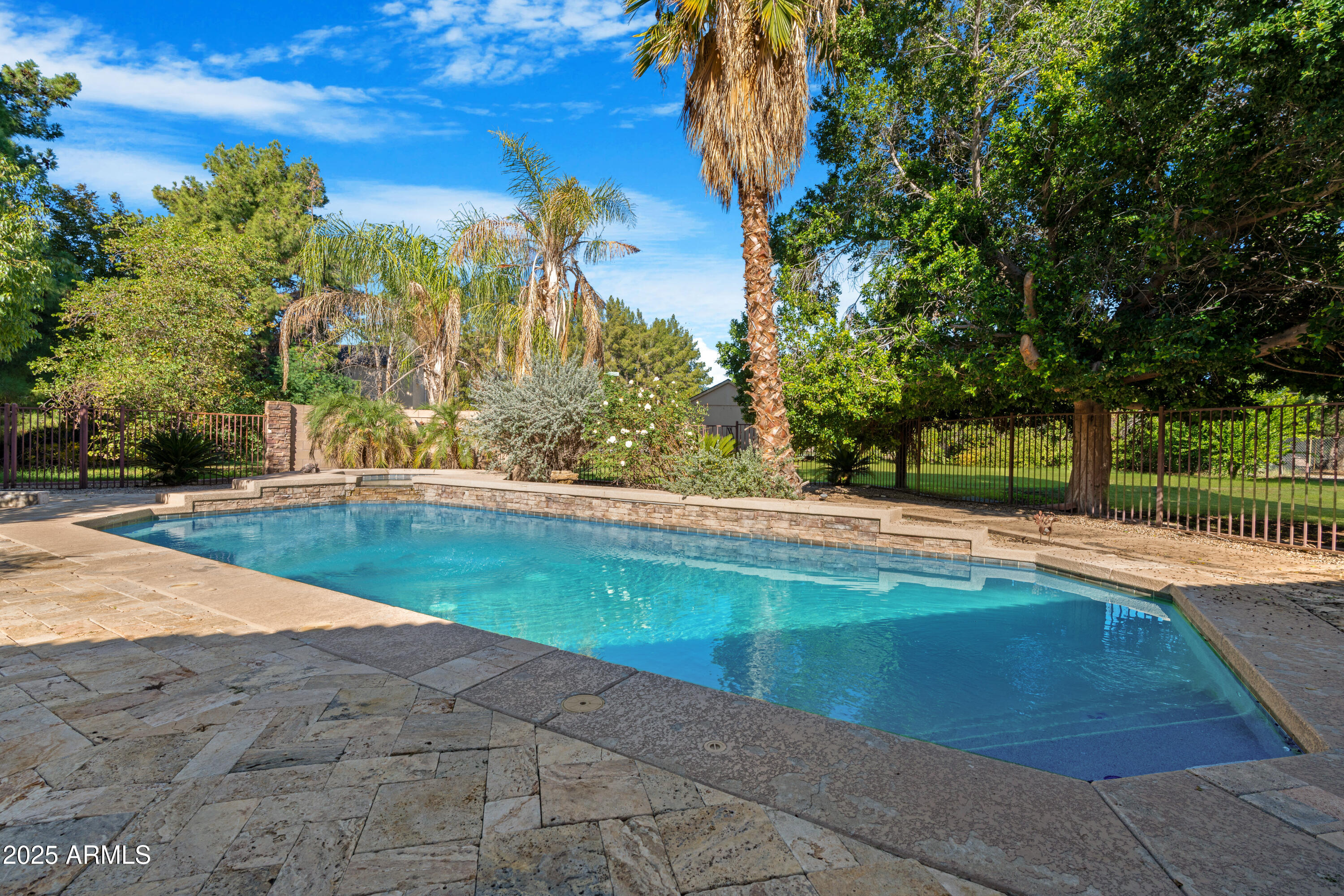 3152 East Irwin Avenue Mesa, AZ 85204 - Photo 2 of 39 a view of swimming pool with a yard