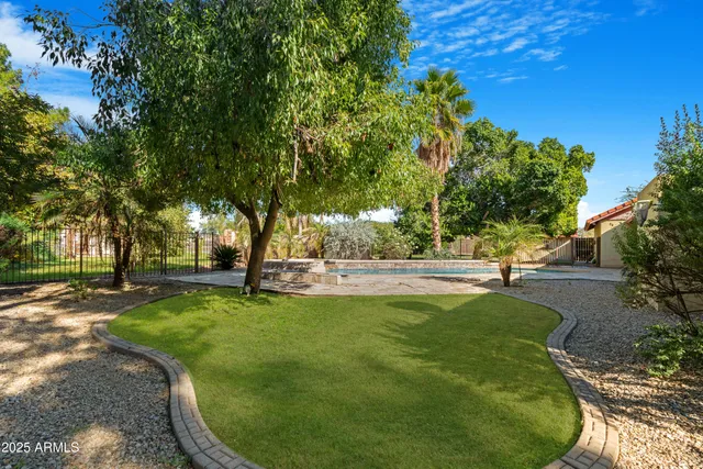 a view of a swimming pool in a yard