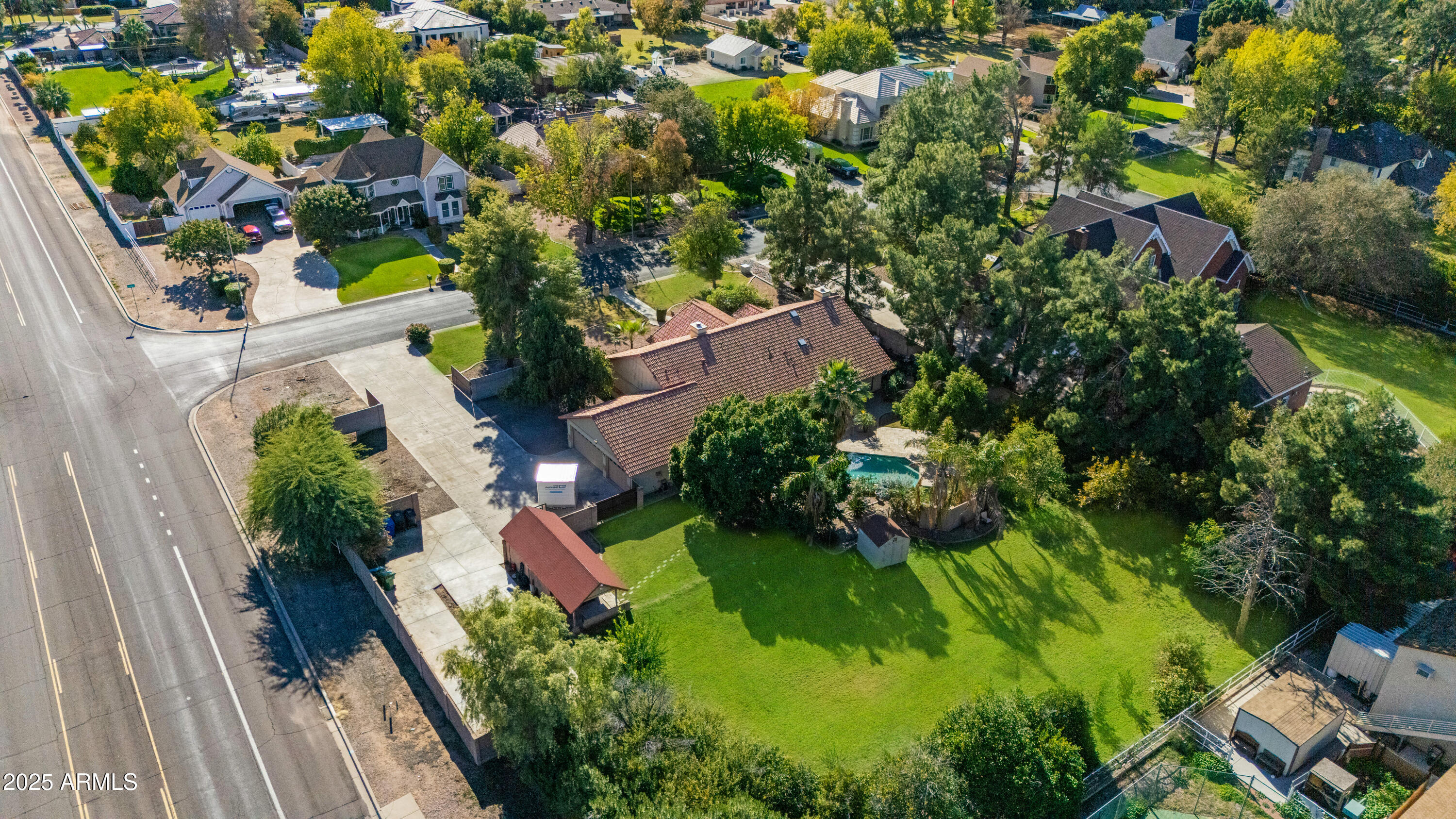 3152 East Irwin Avenue Mesa, AZ 85204 - Photo 5 of 39 view of a house with a yard