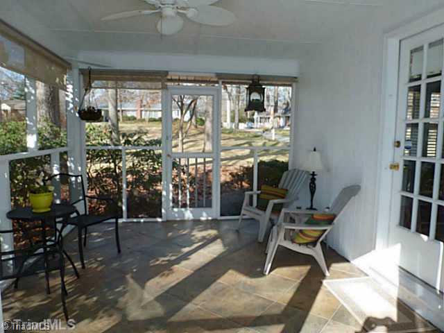 1147 Huntingdon Road Winston-Salem, NC 27104 - Photo 4 of 16 Screened Porch. This screened porch leads into the formal dining room.