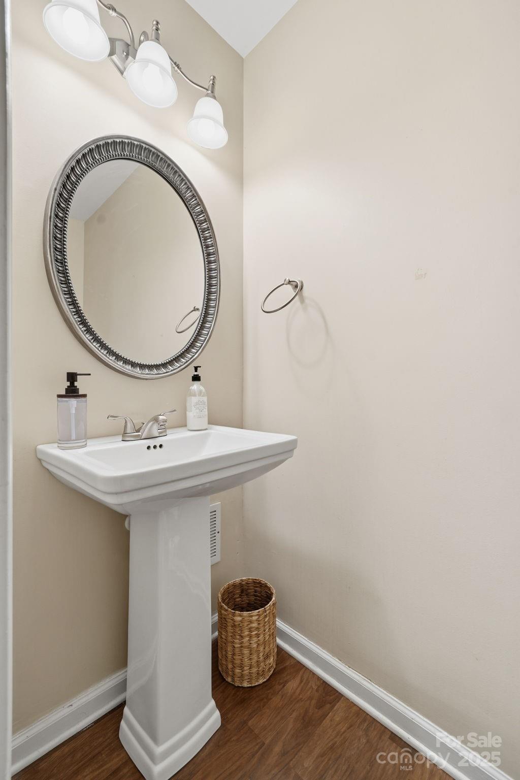 110 Nahcotta Drive Mooresville, NC 28115 - Photo 20 of 29 a bathroom with a sink and a mirror