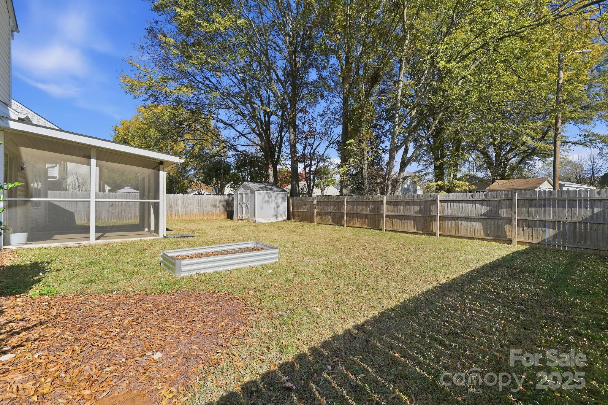 110 Nahcotta Drive Mooresville, NC 28115 - Photo 29 of 29 a house with trees in front of it