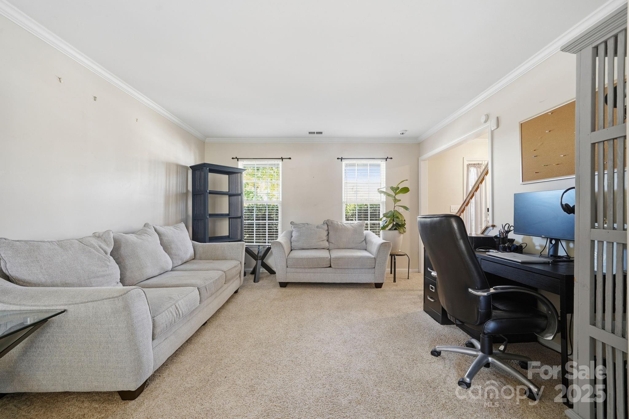 110 Nahcotta Drive Mooresville, NC 28115 - Photo 10 of 29 a living room with furniture and a window