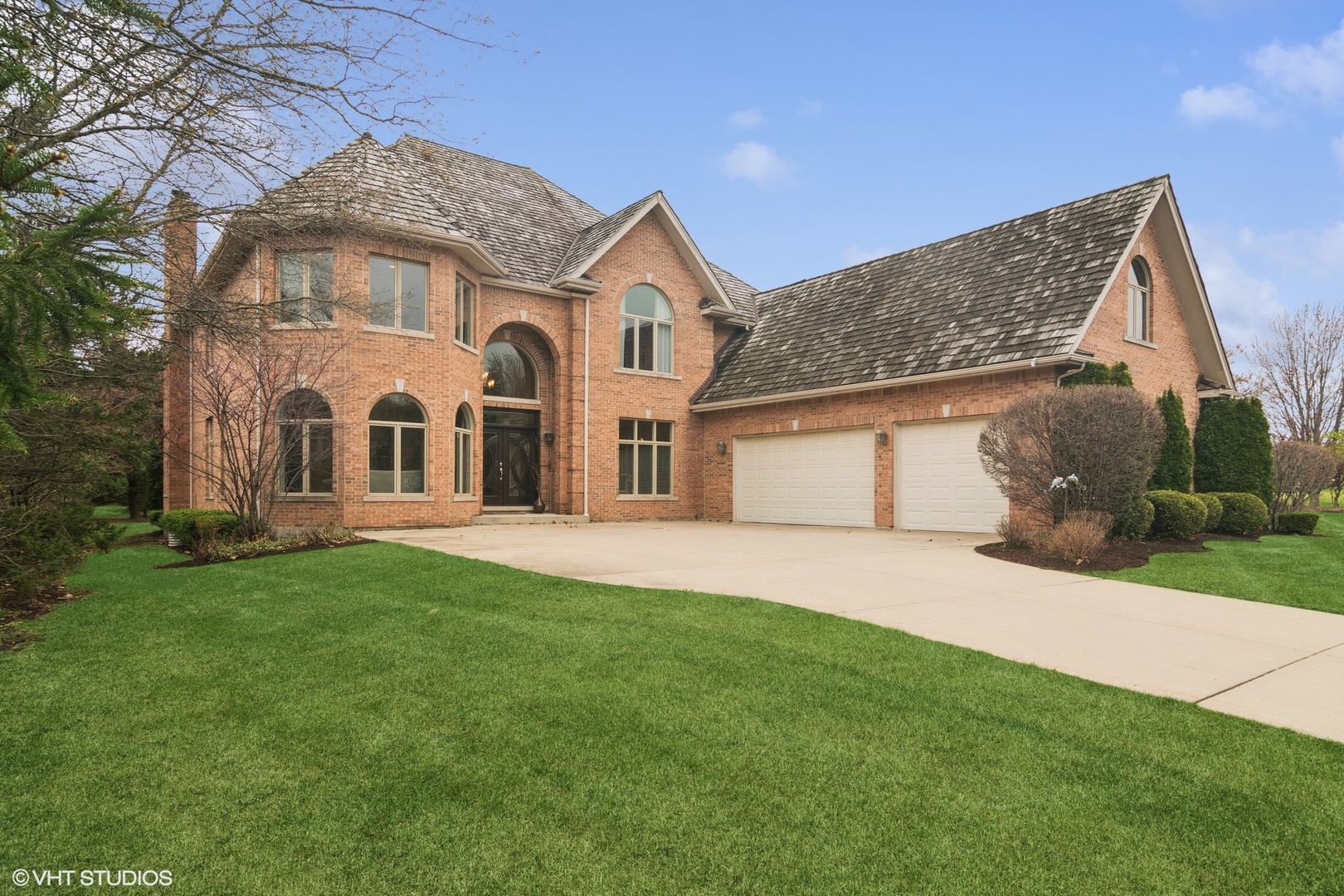 1736 Pebble Beach Way Vernon Hills, IL 60061 - Photo 1 of 1 a view of a yard in front of a house