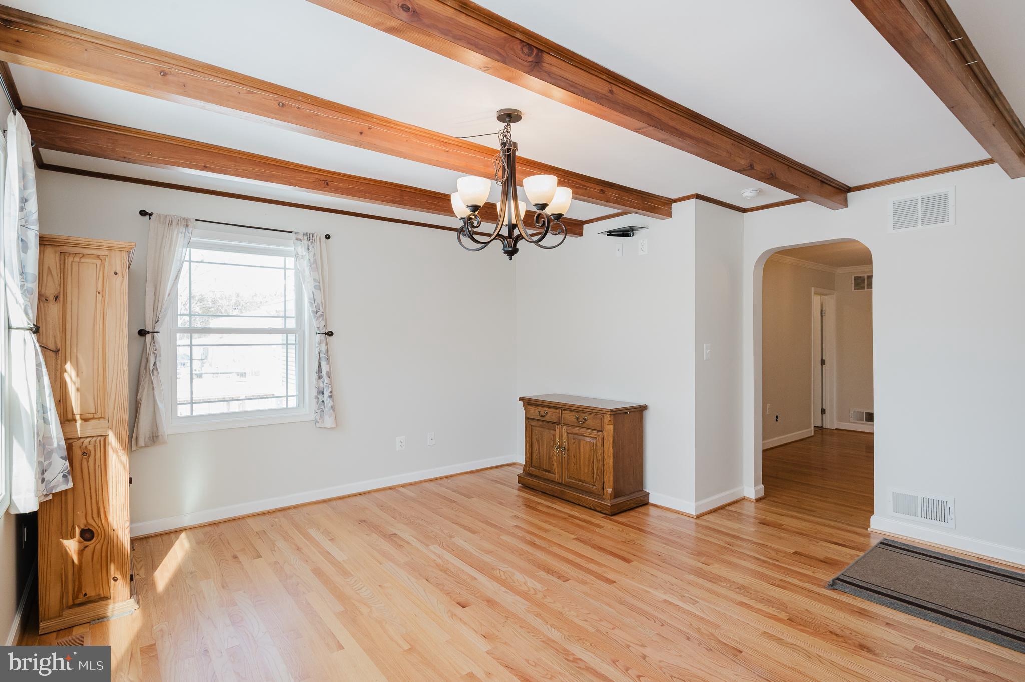 2210 Pleasantville Road Fallston, MD 21047 - Photo 12 of 56 a view of an empty room with wooden floor and a window