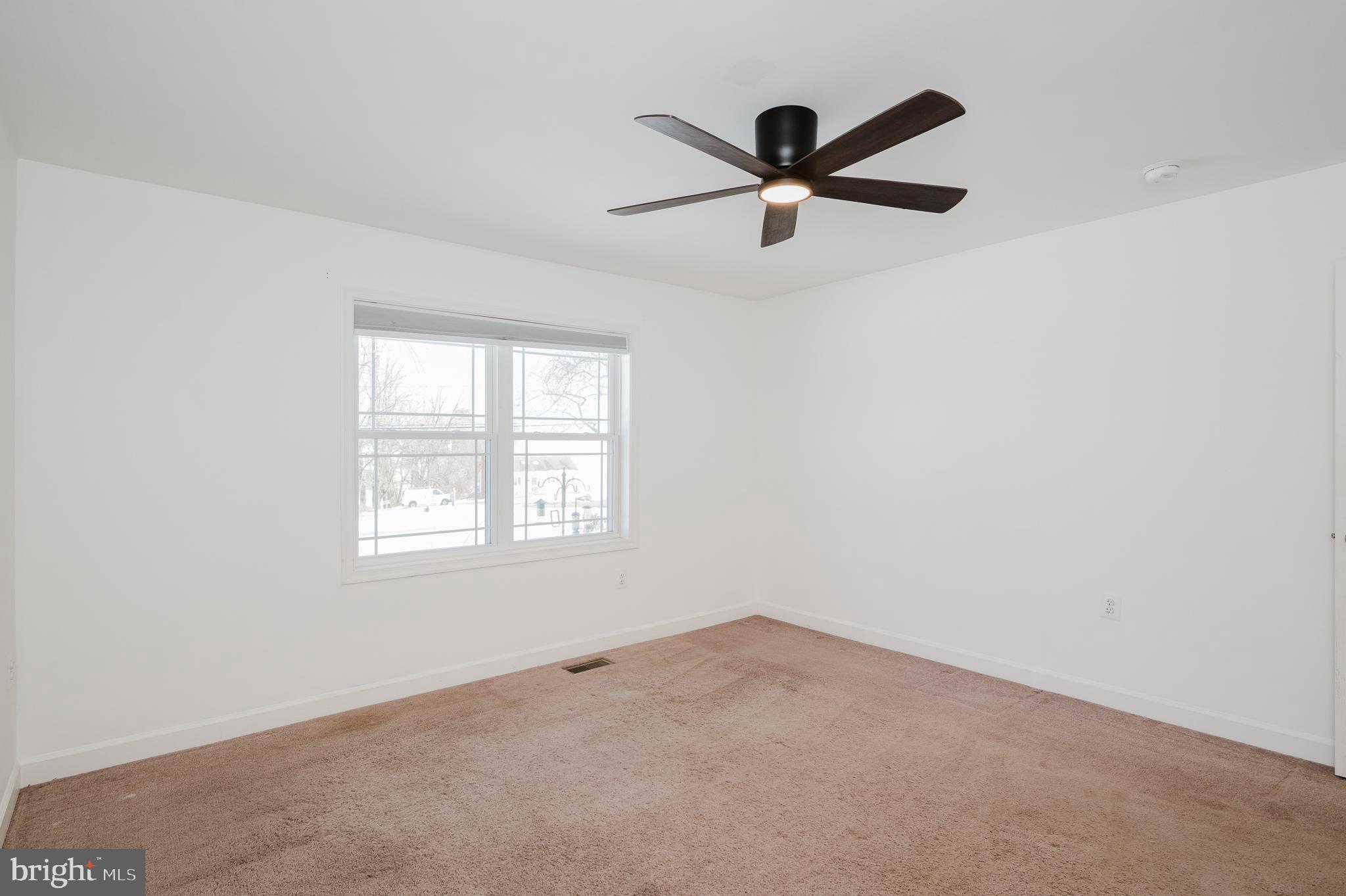 2210 Pleasantville Road Fallston, MD 21047 - Photo 31 of 56 a view of a big room with windows and chandelier fan