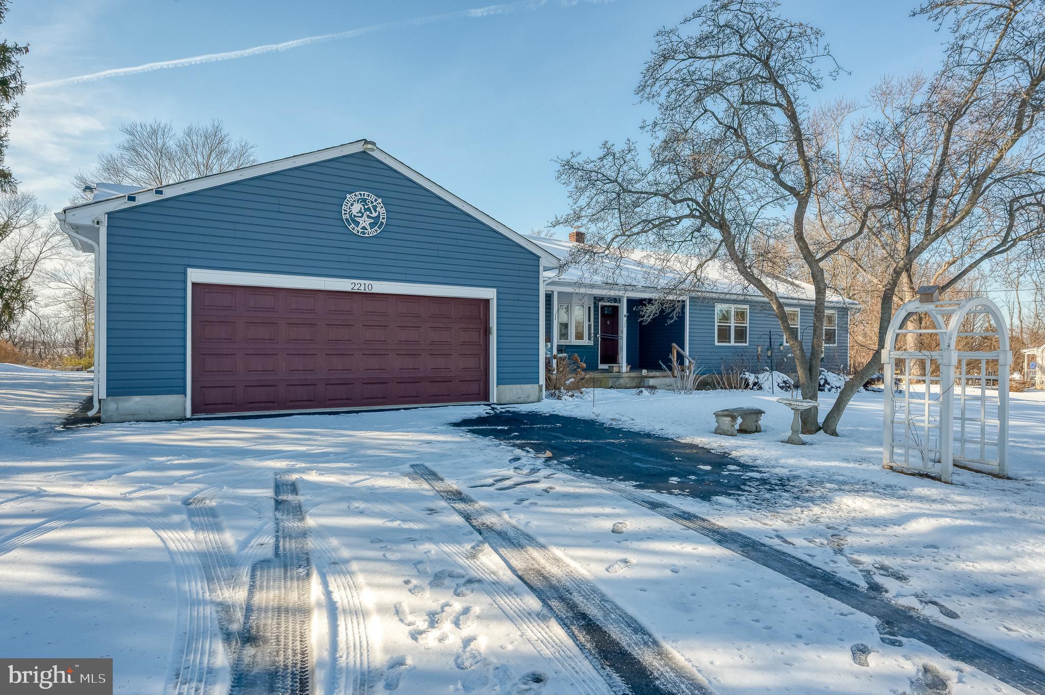 2210 Pleasantville Road Fallston, MD 21047 - Photo 54 of 56 a front view of a house with a yard and garage