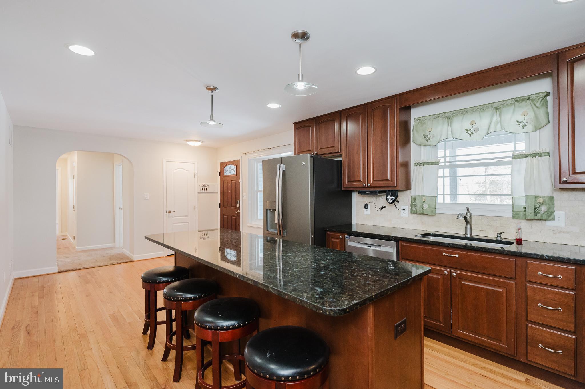 2210 Pleasantville Road Fallston, MD 21047 - Photo 7 of 56 a kitchen with stainless steel appliances granite countertop a sink counter space and a window