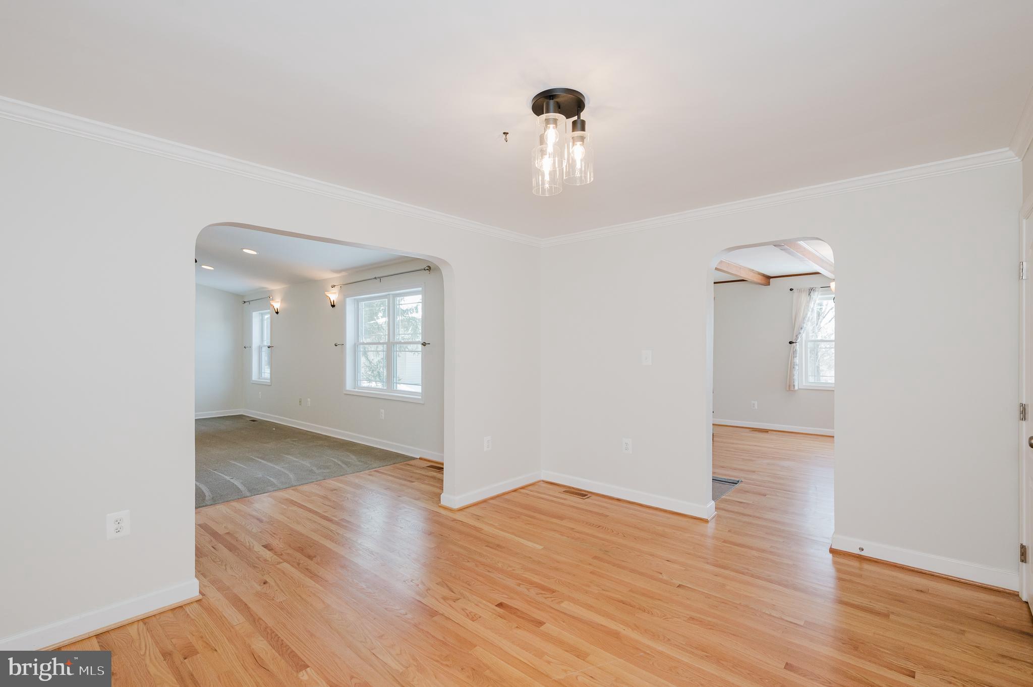 2210 Pleasantville Road Fallston, MD 21047 - Photo 8 of 56 a view of an empty room with wooden floor and a window