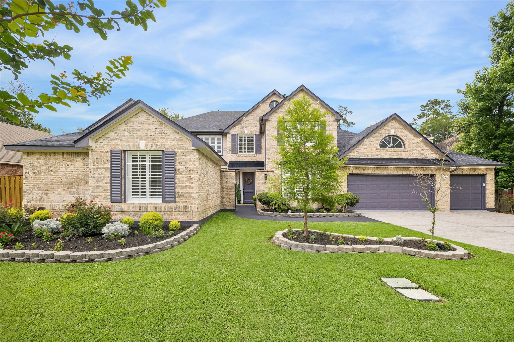 15 West Beckonvale Circle The Woodlands, TX 77382 - Photo 44 of 44 This charming property is thoughtfully designed with an open layout, soaring ceilings & expansive windows. The home is filled with natural light & offers an inviting, airy atmosphere throughout. Don't miss this one!