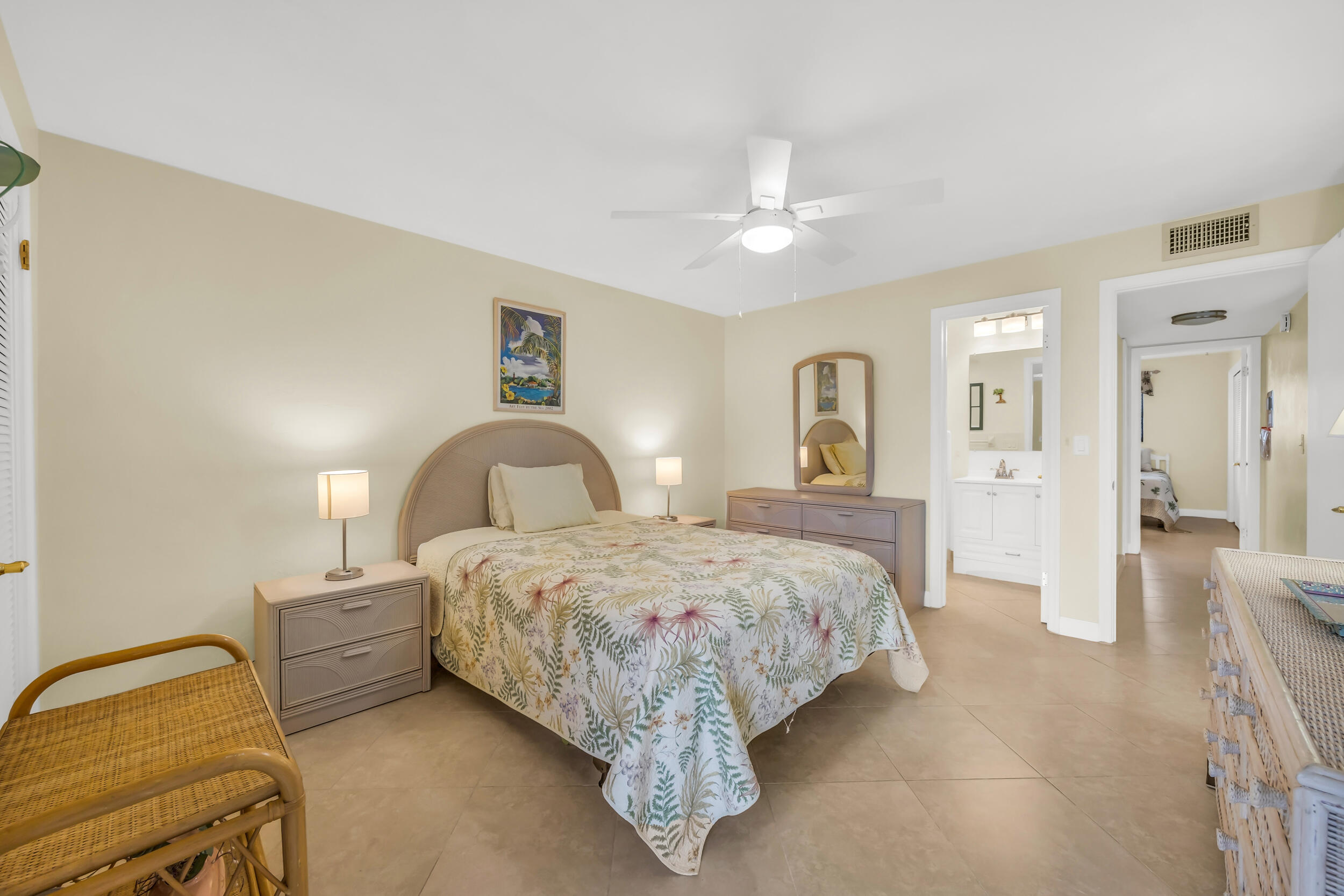 755 Saturn Street, Unit G101 Jupiter, FL 33477 - Photo 25 of 31 a bed room with a bed and closet