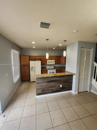 a view of kitchen and window