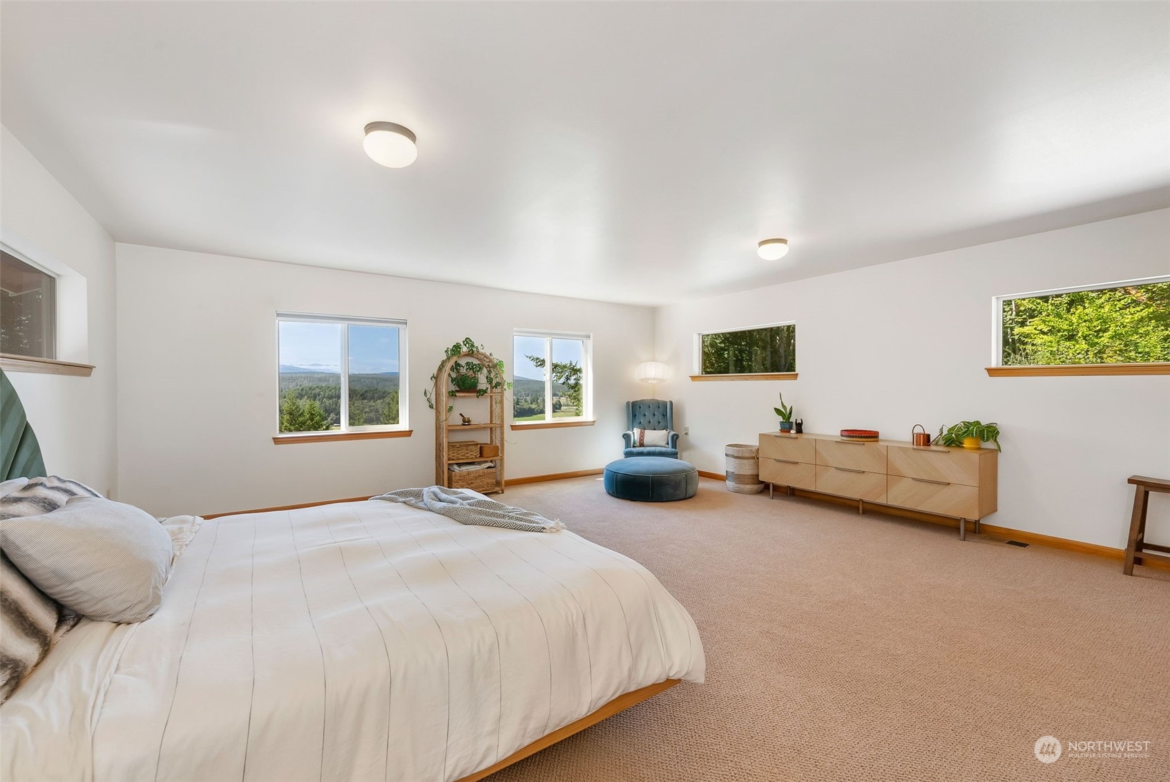 702 Sugar Hill Road Port Hadlock, WA 98339 - Photo 23 of 40 a bedroom with furniture and large window