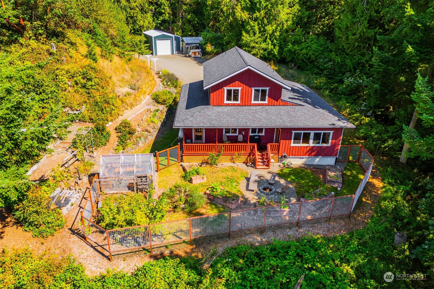 702 Sugar Hill Road Port Hadlock, WA 98339 - Photo 3 of 40 an aerial view of a house