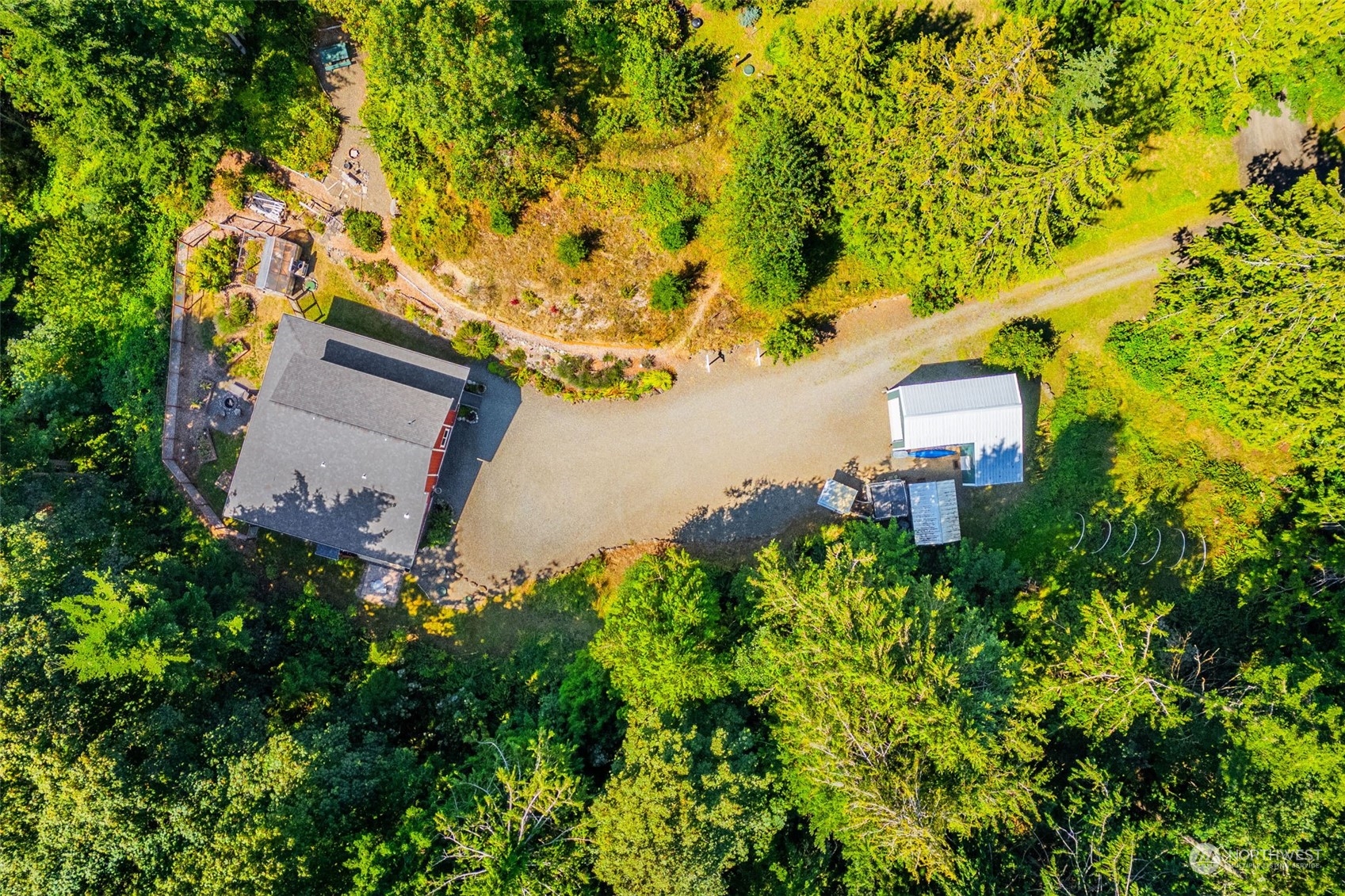 702 Sugar Hill Road Port Hadlock, WA 98339 - Photo 34 of 40 an aerial view of a house with a yard and garden space