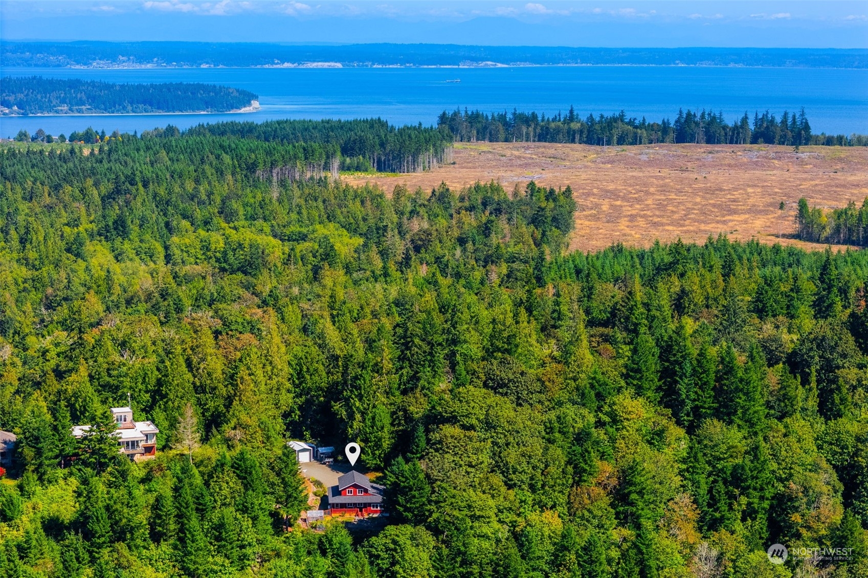 702 Sugar Hill Road Port Hadlock, WA 98339 - Photo 36 of 40 a view of a lake with a city view
