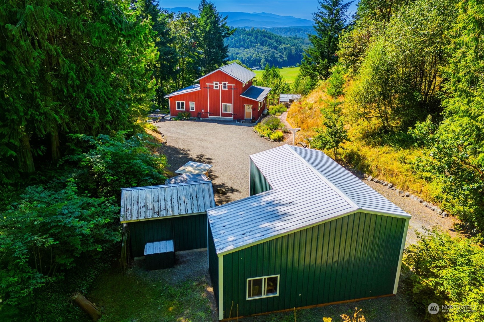 702 Sugar Hill Road Port Hadlock, WA 98339 - Photo 4 of 40 an aerial view of a house